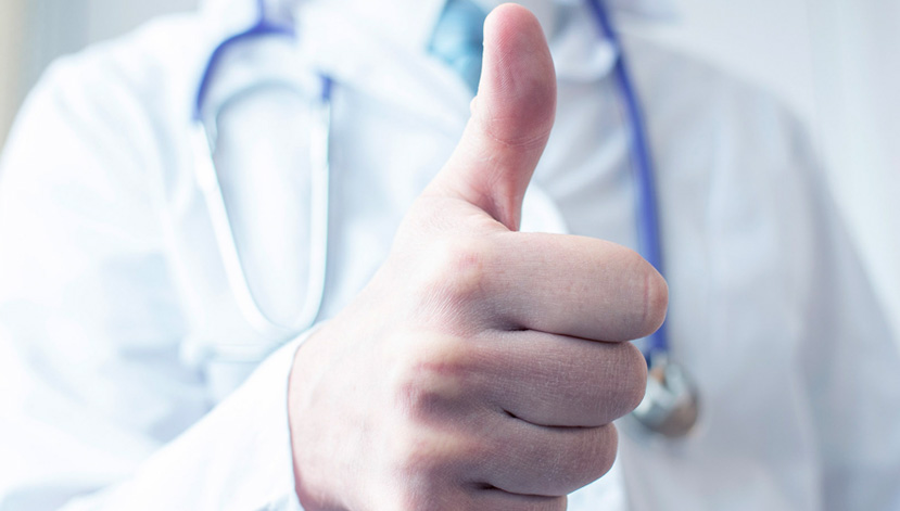 doctor giving thumbs up